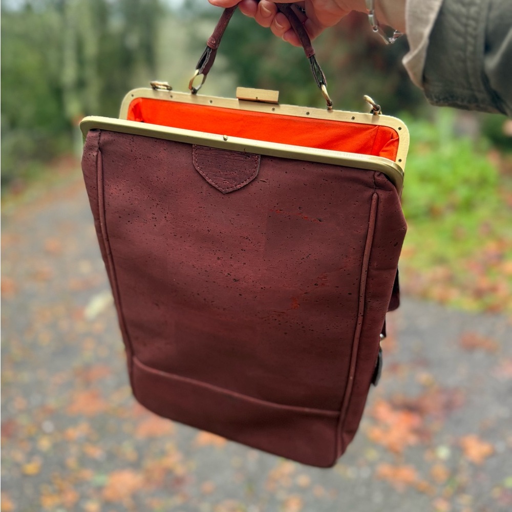 Elegant Brown Handbag with Orange Interior